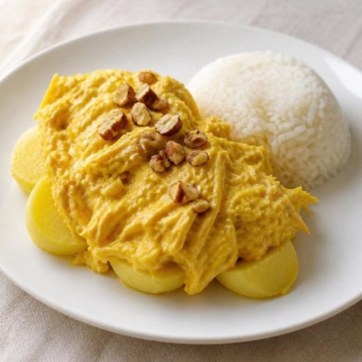 Ají de gallina con arroz y papa